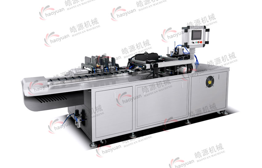 暖貼套袋機(jī)